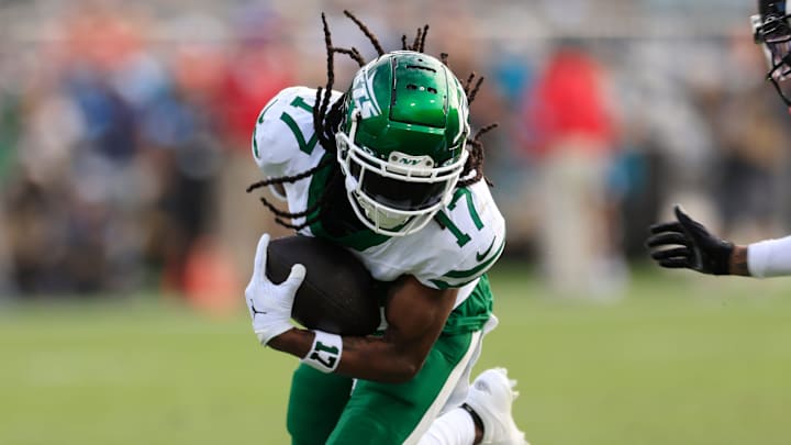 New York Jets wide receiver Davante Adams (17) rushes for yards during the third quarter Sunday, Dec. 15, 2024 at EverBank Stadium in Jacksonville, Fla. The Jets held off the Jaguars 32-25. [Corey Perrine/Florida Times-Union]