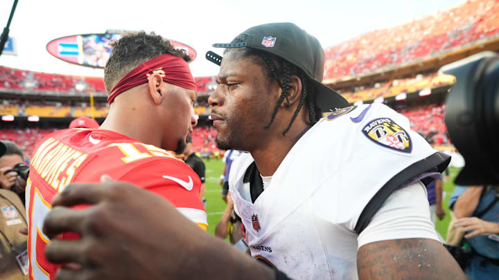 Sep 28, 2025; Kansas City, Missouri, USA; Baltimore Ravens quarterback Lamar Jackson (8) and Kansas City Chiefs quarterback Patrick Mahomes (15) greet each other on the field after the game at GEHA Field at Arrowhead Stadium. Mandatory Credit: Jay Biggerstaff-Imagn Images