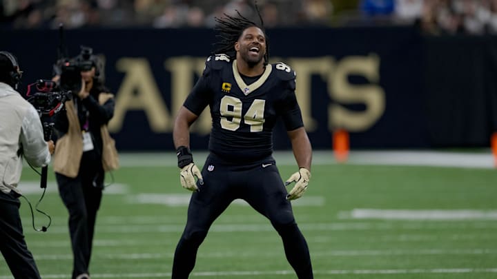 Dec 29, 2024; New Orleans, Louisiana, USA; New Orleans Saints defensive end Cameron Jordan (94) does the “Who Dat?” chant before a game against the Las Vegas Raiders at Caesars Superdome. Mandatory Credit: Matthew Hinton-Imagn Images Dec 29, 2024; New Orleans, Louisiana, USA; New Orleans Saints defensive end Cameron Jordan (94) does the “Who Dat?” chant before a game against the Las Vegas Raiders at Caesars Superdome. Mandatory Credit: Matthew Hinton-Imagn Images