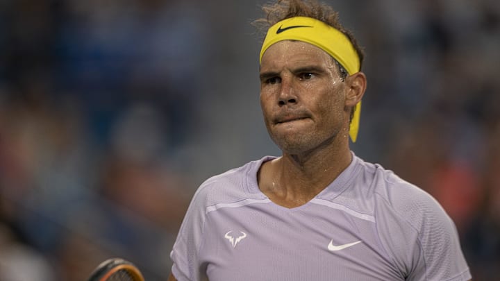 Aug 17, 2022; Cincinnati, OH, USA; Rafael Nadal (ESP) reacts to a point during his match against Borna Coric (CRO)  at the Western & Southern Open at the at the Lindner Family Tennis Center. 