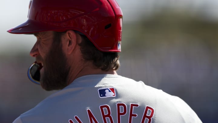 Mar 4, 2024; Dunedin, Florida, USA;  Philadelphia Phillies first baseman Bryce Harper (3) looks on