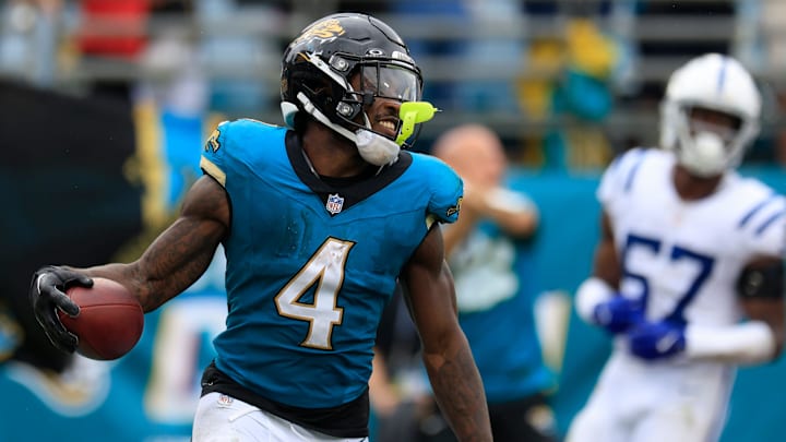 Jacksonville Jaguars running back Tank Bigsby (4) reacts to his touchdown score during the fourth quarter of an NFL football matchup Sunday, Oct. 6, 2024 at EverBank Stadium in Jacksonville, Fla. The Jaguars edged the Colts on a field goal 37-34. [Corey Perrine/Florida Times-Union]