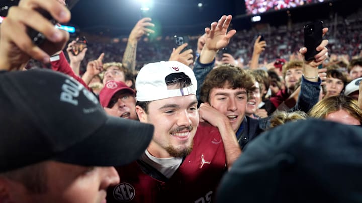 Oklahoma Sooners quarterback Jackson Arnold (11) celebrates with fans after a college football game between the University of Oklahoma Sooners (OU) and the Alabama Crimson Tide at Gaylord Family - Oklahoma Memorial Stadium in Norman, Okla., Saturday, Nov. 23, 2024. Oklahoma won 24-3.