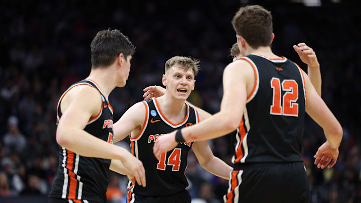 Princeton Tigers guard Matt Allocco gathers with forward Caden Pierce (12) and forward Zach Martini against the Arizona Wildcats during the second half at Golden 1 Center. 