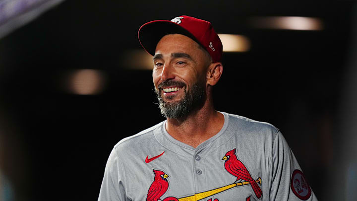  St. Louis Cardinals pinch hitter Matt Carpenter (13) reacts to an infield play against the Colorado Rockies in the seventh inning at Coors Field.