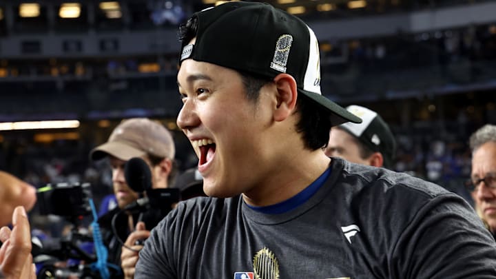 Oct 30, 2024; New York, New York, USA; Los Angeles Dodgers designated hitter Shohei Ohtani (17) celebrates after winning the 2024 MLB World Series against the New York Yankees at Yankee Stadium. Mandatory Credit: Vincent Carchietta-Imagn Images