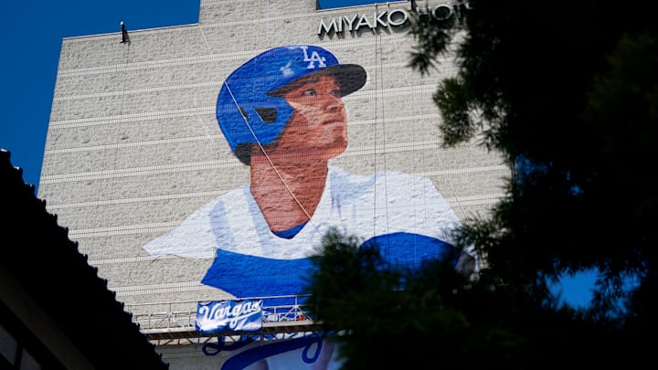 Artist Robert Vargas works on a mural of Shohei Ohtani. The 150 foot by 60 foot mural is on the east wall of the 11-story Miyako Hotel in the Little Tokyo District of Los Angeles. The mural will be officially unveiled on March 27, the day before the Dodgers play their first home game of the 2024 season.