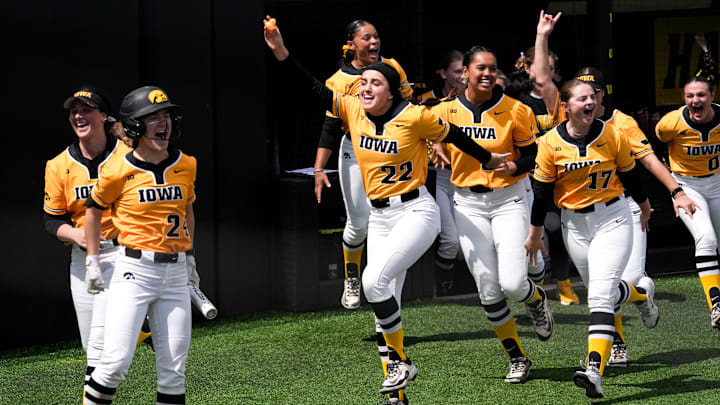 Iowa softball celebrates after a home run is hit against Penn State on April 21, 2025, at Pearl Field in Iowa City, Iowa.