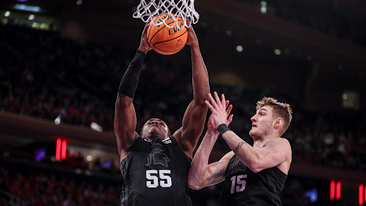 Jan 25, 2025; New York, New York, USA; Michigan State Spartans forward Coen Carr (55) rebounds during the first half against the Rutgers Scarlet Knights at Madison Square Garden. Mandatory Credit: Vincent Carchietta-Imagn Images