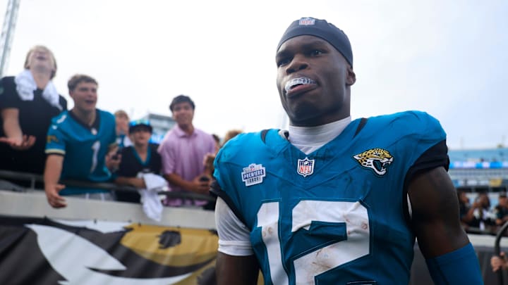 Jacksonville Jaguars wide receiver Travis Hunter (12) walks to greet fans after the game of an NFL football matchup at EverBank Stadium, Sunday, Sept. 7, 2025 in Jacksonville, Fla. The Jaguars defeated the Panthers 26-10. [Corey Perrine/Florida Times-Union]