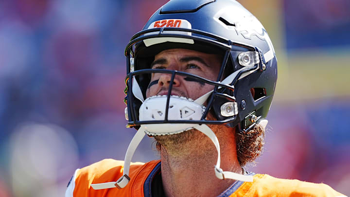 Oct 13, 2024; Denver, Colorado, USA; Denver Broncos quarterback Jarrett Stidham (8) looks on before the game against the Los Angeles Chargers at Empower Field at Mile High. 