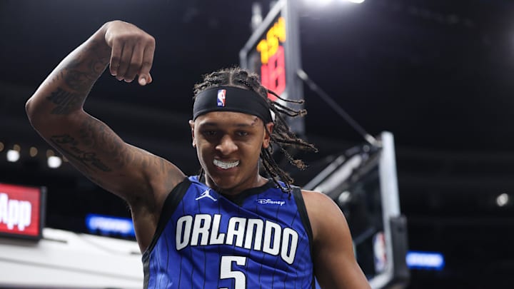 Apr 15, 2025; Orlando, Florida, USA; Orlando Magic forward Paolo Banchero (5) reacts after basket against the Atlanta Hawks in the fourth quarter at Kia Center. Mandatory Credit: Nathan Ray Seebeck-Imagn Images