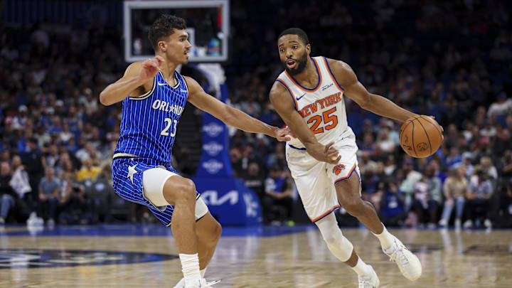 Nov 7, 2025; Orlando, Florida, USA;  New York Knicks guard Mikal Bridges (25) is guarded by Orlando Magic forward Tristan da Silva (23) in the first quarter at Kia Center. Mandatory Credit: Nathan Ray Seebeck-Imagn Images