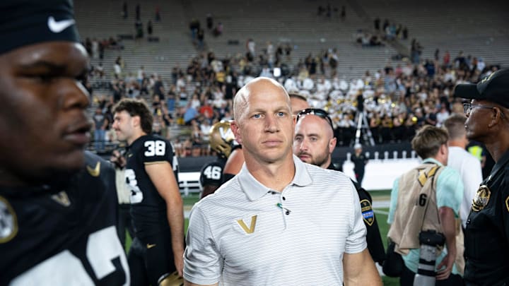 Vanderbilt coach Clark Lea walks the field after beating Charleston Southern at FirstBank Stadium in Nashville, Tenn., Saturday, Aug. 30, 2025.