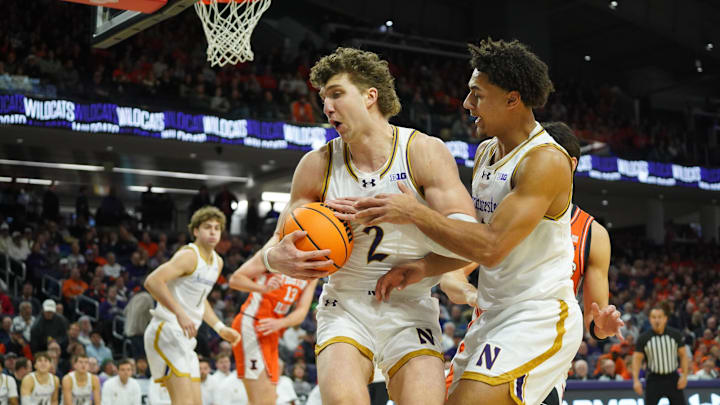 Jan 14, 2026; Evanston, Illinois, USA; Northwestern Wildcats forward Nick Martinelli (2) grabs a rebound against the Illinois Fighting Illini during the first half at Welsh-Ryan Arena. Mandatory Credit: David Banks-Imagn Images