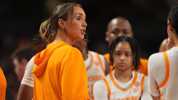 Mar 5, 2026; Greenville, SC, USA; Tennessee Volunteers head coach Kim Caldwell tails wot her tea, during a time out against the Alabama Crimson Tide during the first half at Bon Secours Wellness Arena. Mandatory Credit: Jim Dedmon-Imagn Images