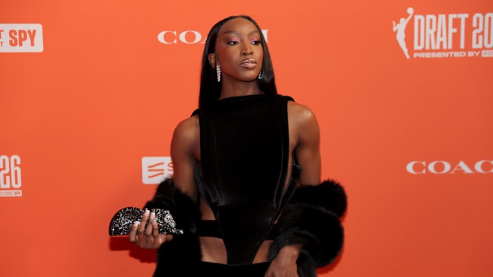 Apr 13, 2026; New York, NY, USA; Flau'jae Johnson poses for a photo on the orange carpet before the 2026 WNBA Draft at The Shed at Hudson Yards. Mandatory Credit: Brad Penner-Imagn Images Apr 13, 2026; New York, NY, USA; Flau'jae Johnson poses for a photo on the orange carpet before the 2026 WNBA Draft at The Shed at Hudson Yards. Mandatory Credit: Brad Penner-Imagn Images