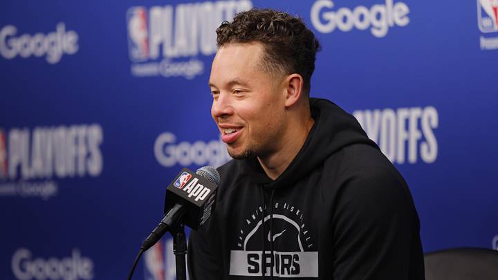 May 10, 2026; Minneapolis, Minnesota, USA; San Antonio Spurs head coach Mitch Johnson speaks to the media before game four of the second round of the 2026 NBA Playoffs against the Minnesota Timberwolves at Target Center. Mandatory Credit: Bruce Kluckhohn-Imagn Images
