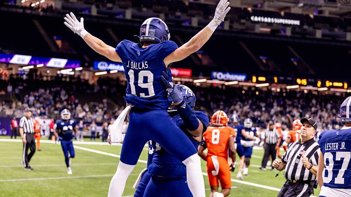 Dec 19, 2024; New Orleans, LA, USA; Georgia Southern Eagles wide receiver Josh Dallas (19) reacts to scoring a touchdown against Sam Houston State Bearkats linebacker Sincere Jackson (8) during the first half at Caesars Superdome. Mandatory Credit: Stephen Lew-Imagn Images Dec 19, 2024; New Orleans, LA, USA; Georgia Southern Eagles wide receiver Josh Dallas (19) reacts to scoring a touchdown against Sam Houston State Bearkats linebacker Sincere Jackson (8) during the first half at Caesars Superdome. Mandatory Credit: Stephen Lew-Imagn Images