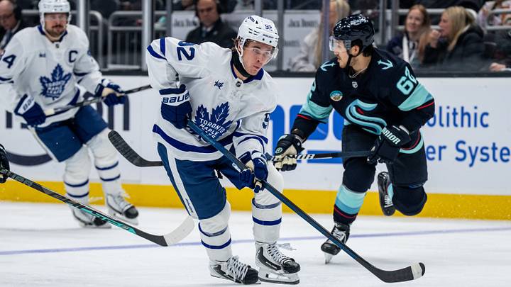 Oct 28, 2026; Seattle, Washington, USA; Toronto Maple Leafs forward Gavin McKenna (92) skates gainst Seattle Kraken defenseman Brandon Montour (62), right, at Climate Pledge Arena. Mandatory Credit: Stephen Brashear-Imagn Images Oct 28, 2026; Seattle, Washington, USA; Toronto Maple Leafs forward Gavin McKenna (92) skates gainst Seattle Kraken defenseman Brandon Montour (62), right, at Climate Pledge Arena. Mandatory Credit: Stephen Brashear-Imagn Images