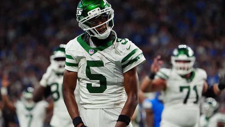 New York Jets wide receiver Garrett Wilson (5) looks at the referee for the call after making a touchdown during the second half of the NFL game at Ford Field in Detroit, Sunday, Sept. 27, 2026.
