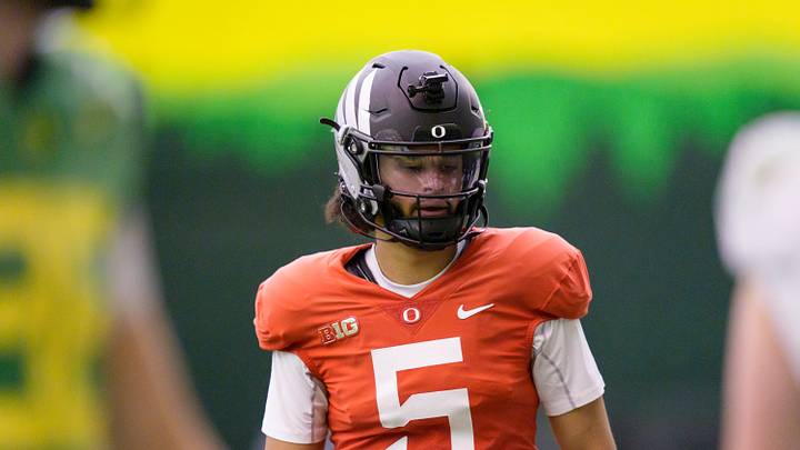 Oregon quarterback Dante Moore works out as the Oregon Ducks practice on Jan. 5, 2025, at the Moshofsky Center in Eugene, Oregon, ahead of the Peach Bowl.