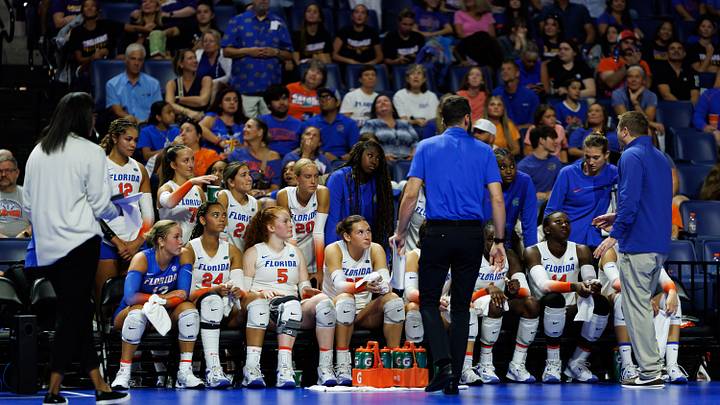 Florida Gators head coach Ryan Theis talks with the team during a timeout during a game against the Norfolk State Spartans at Stephen C. O'Connell Center at the University of Florida in Gainesville, FL on Sunday, August 31, 2025. [Matt Pendleton/Gainesville Sun]
