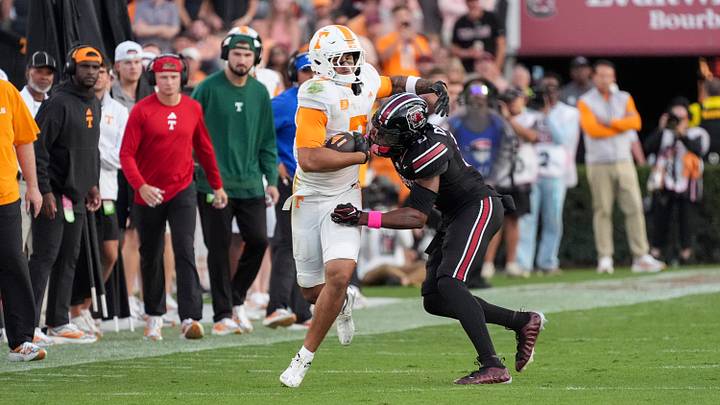 Oct 24, 2026; Columbia, South Carolina, USA;  Tennessee Volunteers tight end Dasaahn Brame (7) runs for yards after catch against South Carolina Gamecocks defensive back Judge Collier (8) during the second half at Williams-Brice Stadium.  Mandatory Credit: Jim Dedmon-Imagn Images