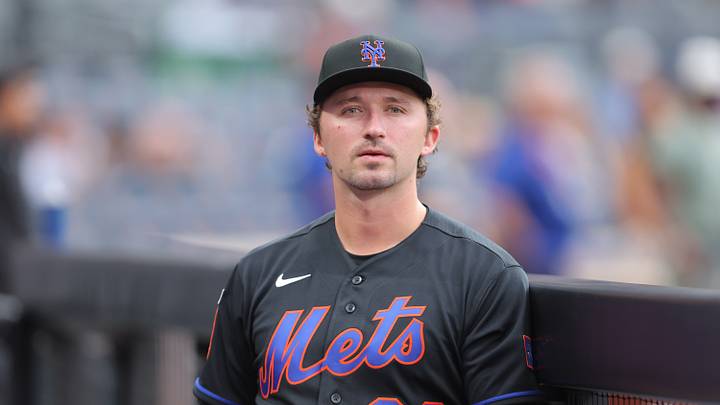 Aug 14, 2026; New York City, New York, USA; New York Mets pitcher Jack Weisenburger (82) in the dugout before a game against the Washington Nationals at Citi Field. Mandatory Credit: Brad Penner-Imagn Images