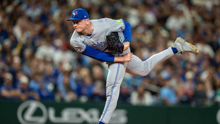 Jul 3, 2026; Seattle, Washington, USA;  Toronto Blue Jays reliever Louis Varland (77) delivers a pitch during the ninth inning against the Seattle Mariners at T-Mobile Park. Mandatory Credit: Stephen Brashear-Imagn Images