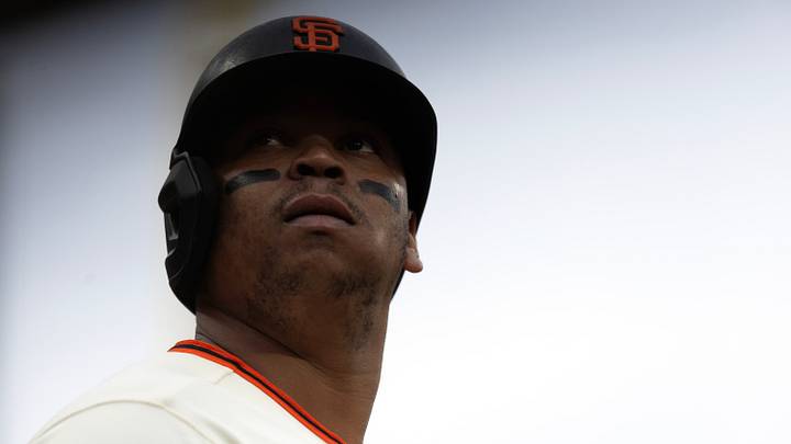 San Francisco, California, USA;  San Francisco Giants first baseman Rafael Devers (16) awaits his turn at bat against the Arizona Diamondbacks during the first inning at Oracle Park.  Mandatory Credit: D. Ross Cameron-Imagn Images