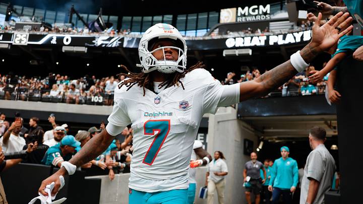 Miami Dolphins wide receiver Caleb Douglas (7) walks onto the field before the game against the Las Vegas Raiders at Allegiant Stadium. 