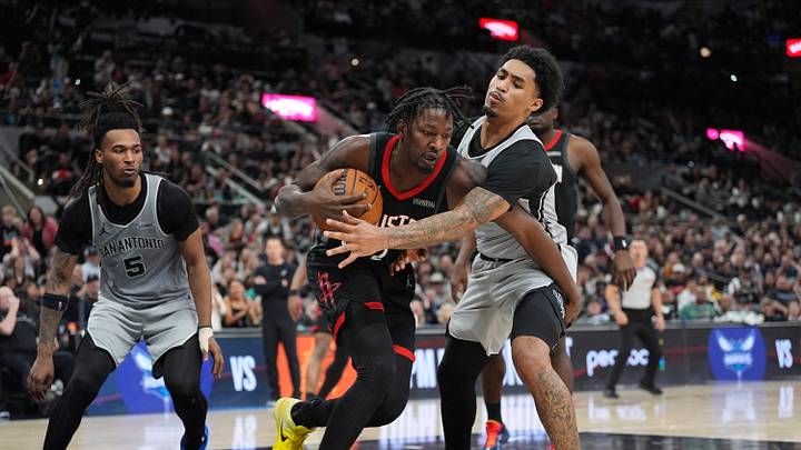 Mar 8, 2026; San Antonio, Texas, USA; Houston Rockets forward Dorian Finney-Smith (2) dribbles against San Antonio Spurs guard Dylan Harper (2) in the second half at Frost Bank Center. Mandatory Credit: Daniel Dunn-Imagn Images Mar 8, 2026; San Antonio, Texas, USA; Houston Rockets forward Dorian Finney-Smith (2) dribbles against San Antonio Spurs guard Dylan Harper (2) in the second half at Frost Bank Center. Mandatory Credit: Daniel Dunn-Imagn Images