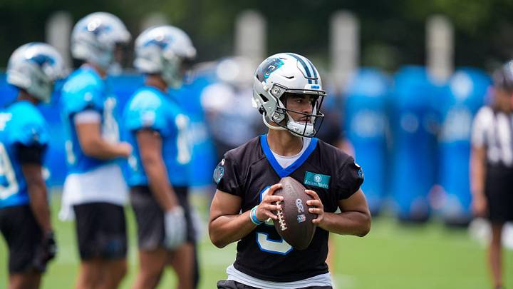Jun 9, 2026; Charlotte, NC, USA;  Carolina Panthers quarterback Bryce Young (9) looks for his receiver during the first day of mini camp at Bank of America Stadium practice facility. Mandatory Credit: Jim Dedmon-Imagn Images