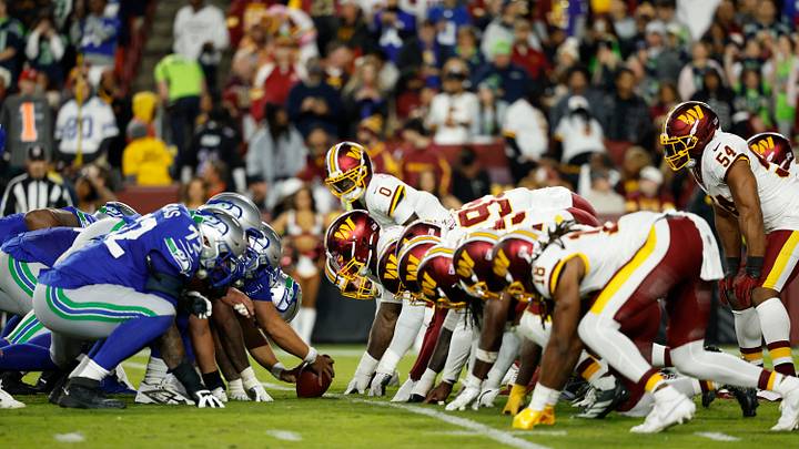 Seattle Seahawks offense lines up for an extra point against Washington Commanders. Seattle Seahawks offense lines up for an extra point against Washington Commanders.