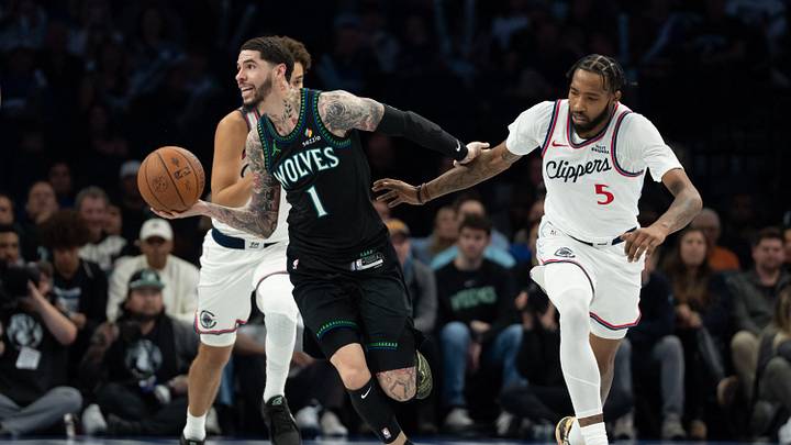 Oct 30, 2026; Minneapolis, Minnesota, USA;  Minnesota Timberwolves guard LaMelo Ball (1) dribbles the ball past LA Clippers forward Derrick Jones Jr. (5) in the first half at Target Center.  Mandatory Credit: Jesse Johnson-Imagn Images