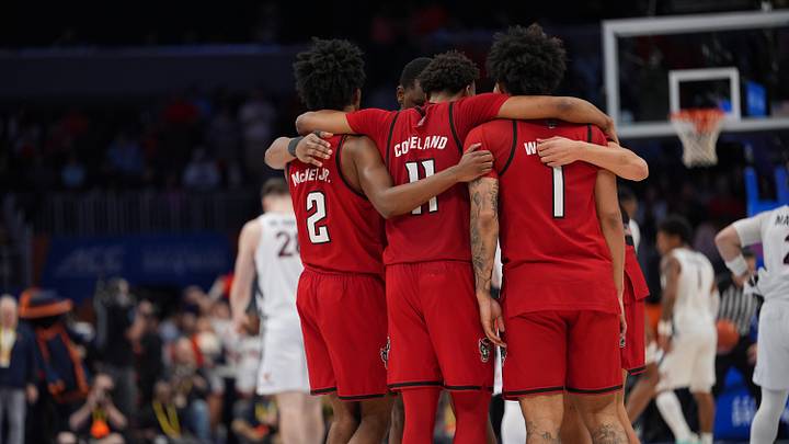 Mar 12, 2026; Charlotte, NC, USA; NC State Wolfpack players react to the loss during the second half against the Virginia Cavaliers at Spectrum Center. Mandatory Credit: Jim Dedmon-Imagn Images Mar 12, 2026; Charlotte, NC, USA; NC State Wolfpack players react to the loss during the second half against the Virginia Cavaliers at Spectrum Center. Mandatory Credit: Jim Dedmon-Imagn Images