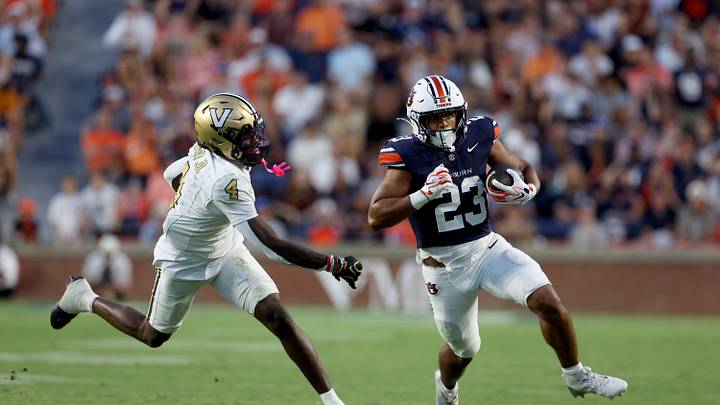 Auburn running back Jeremiah Cobb (23) runs up the field during the Tigers' win over Vanderbilt. Auburn running back Jeremiah Cobb (23) runs up the field during the Tigers' win over Vanderbilt.