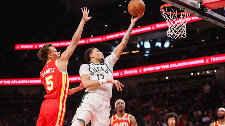 Mar 14, 2026; Atlanta, Georgia, USA; Milwaukee Bucks guard Ryan Rollins (13) shoots past Atlanta Hawks guard Dyson Daniels (5) in the second quarter at State Farm Arena. Mandatory Credit: Brett Davis-Imagn Images Mar 14, 2026; Atlanta, Georgia, USA; Milwaukee Bucks guard Ryan Rollins (13) shoots past Atlanta Hawks guard Dyson Daniels (5) in the second quarter at State Farm Arena. Mandatory Credit: Brett Davis-Imagn Images