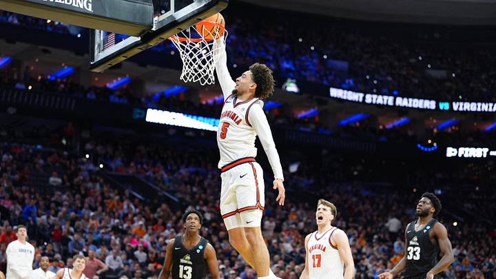 Mar 20, 2026; Philadelphia, PA, USA; Virginia Cavaliers guard Sam Lewis (5) dunks during the second half against the Wright State Raiders during a first round game of the men's 2026 NCAA Tournament at Xfinity Mobile Arena. Mandatory Credit: Kyle Ross-Imagn Images Mar 20, 2026; Philadelphia, PA, USA; Virginia Cavaliers guard Sam Lewis (5) dunks during the second half against the Wright State Raiders during a first round game of the men's 2026 NCAA Tournament at Xfinity Mobile Arena. Mandatory Credit: Kyle Ross-Imagn Images