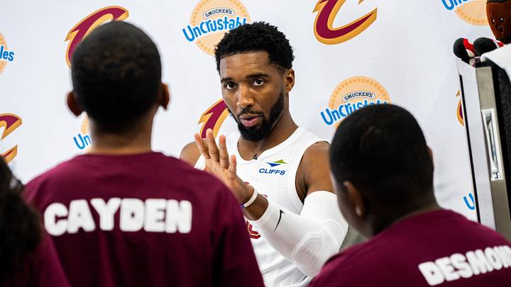 Sep 28, 2026; Cleveland, OH, USA; Cleveland Cavaliers guard Donovan Mitchell (45) talks to the Cavaliers Kids Club during media day at Rocket Arena. Mandatory Credit: Ken Blaze-Imagn Images Sep 28, 2026; Cleveland, OH, USA; Cleveland Cavaliers guard Donovan Mitchell (45) talks to the Cavaliers Kids Club during media day at Rocket Arena. Mandatory Credit: Ken Blaze-Imagn Images