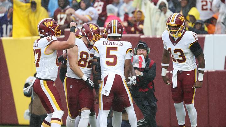 Oct 11, 2026; Landover, Maryland, USA; Washington Commanders quarterback Jayden Daniels (5) celebrates with Jacory Croskey-Merritt after the running back ran for a touchdown during the first quarter against the New York Giants at Northwest Stadium. Mandatory Credit: Geoff Burke-Imagn Images Oct 11, 2026; Landover, Maryland, USA; Washington Commanders quarterback Jayden Daniels (5) celebrates with Jacory Croskey-Merritt after the running back ran for a touchdown during the first quarter against the New York Giants at Northwest Stadium. Mandatory Credit: Geoff Burke-Imagn Images