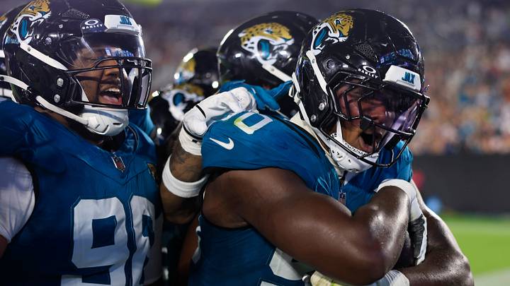 Jacksonville Jaguars defensive end Wesley Williams (90) celebrates his fumble turnover with defensive tackle Jalen Hunt (96), left, and others during the second quarter of an NFL preseason football matchup. Jacksonville Jaguars defensive end Wesley Williams (90) celebrates his fumble turnover with defensive tackle Jalen Hunt (96), left, and others during the second quarter of an NFL preseason football matchup.