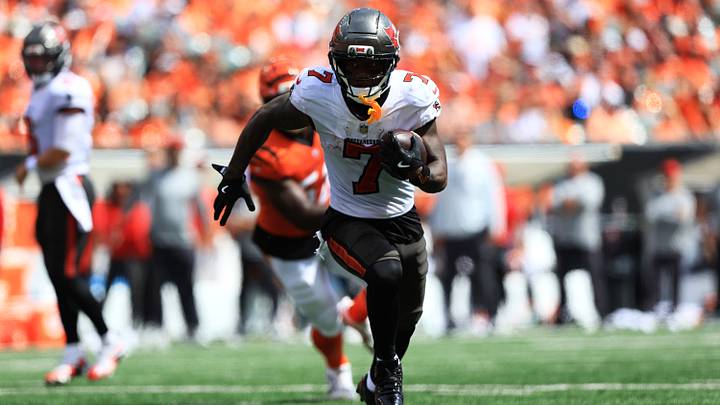 Tampa Bay Buccaneers running back Bucky Irving (7) scores a touchdown during the second quarter at Paycor Stadium.  Mandatory Credit: Katie Stratman-Imagn Images