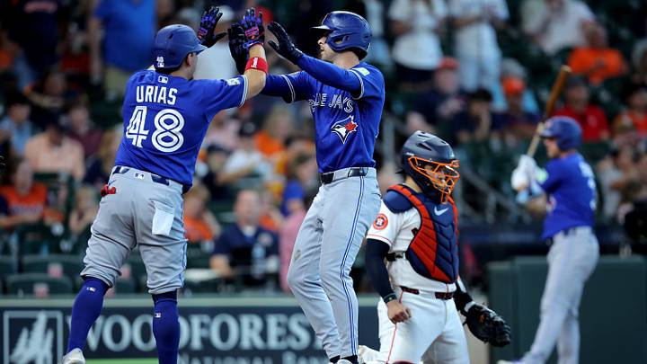 Toronto Blue Jays third baseman Ernie Clement (22) is congratulated by second baseman Luis Urias Mandatory Credit: Erik Williams-Imagn Images Toronto Blue Jays third baseman Ernie Clement (22) is congratulated by second baseman Luis Urias Mandatory Credit: Erik Williams-Imagn Images