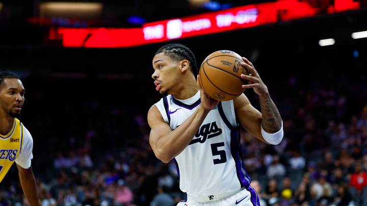 Oct 5, 2026; Sacramento, California, USA;  Sacramento Kings guard Darius Acuff Jr. (5) controls the ball during the first quarter against the Los Angeles Lakers at Golden 1 Center.  Mandatory Credit: Sergio Estrada-Imagn Images