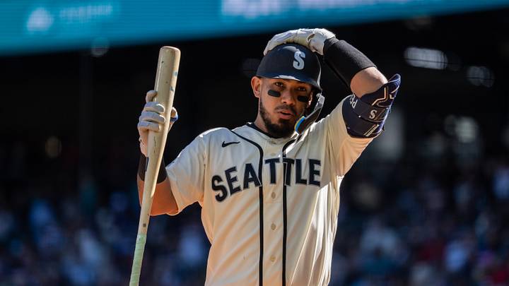 Sep 27, 2026; Seattle, Washington, USA; Seattle Mariners catcher Jhonny Pereda (5) adjusts his batting helmet during a game against the Los Angeles Angels at T-Mobile Park. Mandatory Credit: Stephen Brashear-Imagn Images Sep 27, 2026; Seattle, Washington, USA; Seattle Mariners catcher Jhonny Pereda (5) adjusts his batting helmet during a game against the Los Angeles Angels at T-Mobile Park. Mandatory Credit: Stephen Brashear-Imagn Images