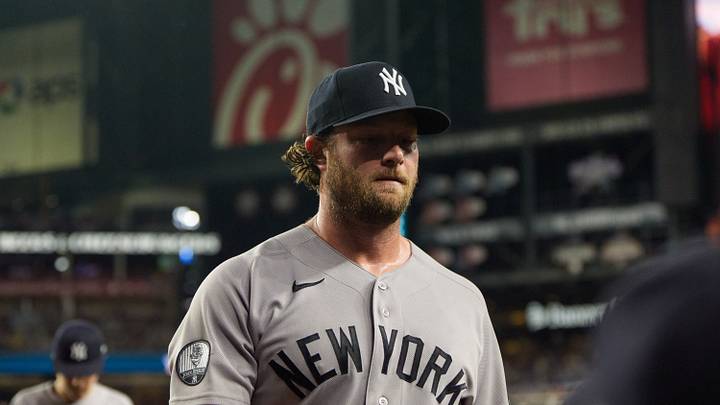 New York Yankees pitcher Gerrit Cole (45) walks in after pitching in the fifth inning of a game against the Arizona Diamondbacks at Chase Field.