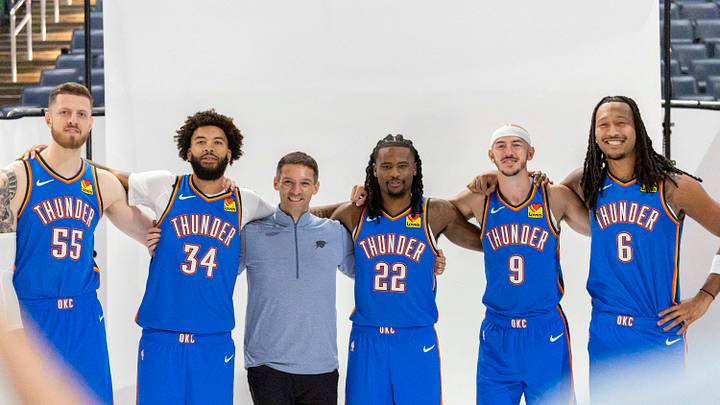 Sep 28, 2026; Oklahoma City, OK, USA; Oklahoma City Thunder center/forward Isaiah Hartenstein (55), guard/forward Kenrich Williams (34), Head Coach Mark Daigneault, guard Cason Wallace (22), guard Alex Caruso (9) and forward Jaylin Williams (6) pose for a photo during Oklahoma City Thunder Media Day at Paycom Center. Mandatory Credit: Alonzo Adams-Imagn Images