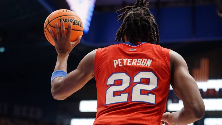 Kansas Jayhawks guard Darryn Peterson (22) passes the ball against Kansas State Wildcats during the Sunflower Showdown game inside Allen Fieldhouse in Lawrence, Kansas, on Saturday, March 7, 2026. Kansas Jayhawks guard Darryn Peterson (22) passes the ball against Kansas State Wildcats during the Sunflower Showdown game inside Allen Fieldhouse in Lawrence, Kansas, on Saturday, March 7, 2026.